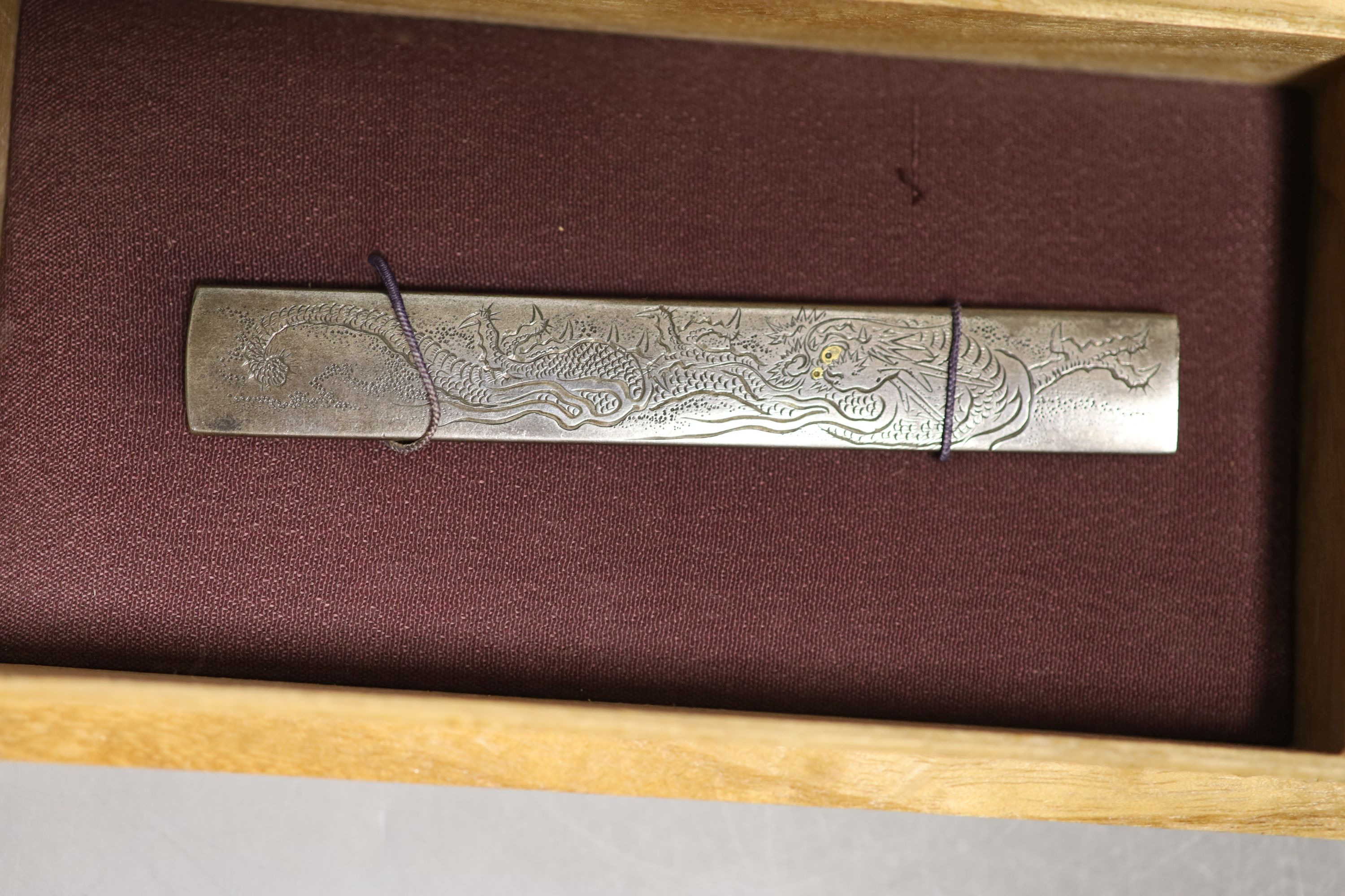 A Japanese mixed metal ‘dragon’ kozuka handle, 19th century, boxed